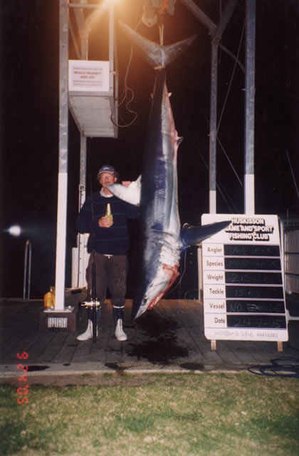 Dave Venn with a 210 Kg Mako Shark on 15 Kg Line
